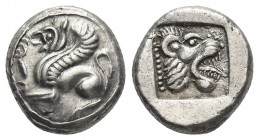 TROAS, Assos. (Circa 500-450 BC). AR, Drachm.
Obv: Griffin seated left; tongue out.
Rev: Lion head right, prominent teeth and tongue out; within squ...
