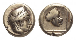 LESBOS, Mytilene. (Circa 412-378 BC). EL Hekte.
Obv: Head of Artemis-Kybele right, wearing stephane decorated with palmettes.
Rev: Comic mask right ...