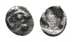 IONIA, Kolophon. (Circa 530/25-500 BC). AR, Tetartemorion.
Obv: Archaic head of Apollo right.
Rev: Quadripartite incuse square.
Cf. SNG Kayhan 352...