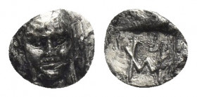 IONIA, Kolophon. (Circa 450-410 BC). AR, Hemiobol.
Obv: Facing laureate head of Apollo between two laurel leafs..
Rev: Monogram of HM (mark of value...
