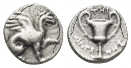 IONIA, Teos. (Circa 370-340 BC). AR, Hemidrachm. Diogenes, magistrate.
Obv: Griffin seated right, raising forepaw.
Rev: THI / ΔIOΓENHΣ.
Kantharos....