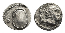 CILICIA. Tarsos. Balakros. AR Obol (Circa 333-323 BC).
Obv: Helmeted head of Athena right.
Rev: Boeotian shield; B to left.
Göktürk 28; SNG BN 489a...