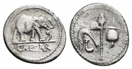 JULIUS CAESAR. AR, Denarius (49 BC). Military mint traveling with Caesar.
Obv: CAESAR.
Elephant advancing right, trampling upon horned serpent.
Rev...