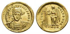 THEODOSIUS II (402-450 AD). GOLD Solidus, Constantinople.
Obv: δ N THEODOSIVS P F AVG.
Helmeted and cuirassed bust facing slightly right, holding sp...