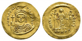 MAURICE TIBERIUS (582-602 AD). GOLD Solidus, Constantinople.
Obv: δ N MAVRC TIЬ P P AVG.
Helmeted, draped and cuirassed bust facing, holding globus ...