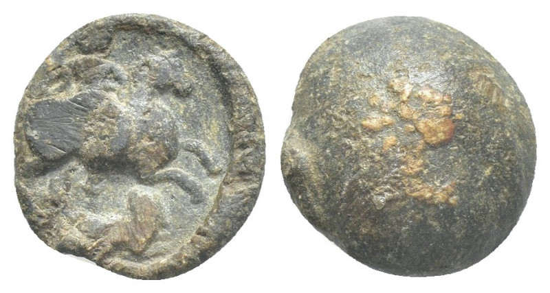 PB Roman lead seal (c. 3th-4th century AD).
Obv: Horseman galloping r.; below u...