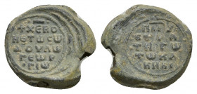 PB Byzantine lead seal. Seal of Georgios Kakikes, patrikios and strategos (11th century)
Obv: Inscription in five lines with decoration above: ΚΕ̅Ο...