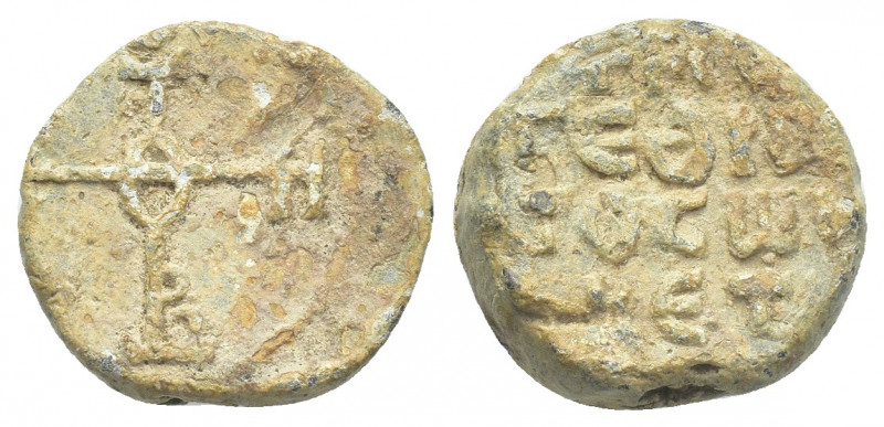 PB Byzantine lead seal. (c. 8th-9th century)
Obv: Cruciform invocative monogram...