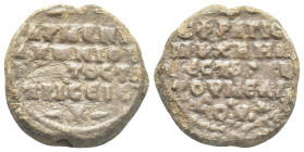 PB Byzantine lead seal. Michael, vestes, Armeniakoi (11th century)
Obv: Inscription in four lines with decoration above and below. Border of dots.
R...