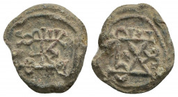 PB Byzantine lead seal. Seal of Marianos apo hypaton (6th-7th century).
Obv: Block monogram. Wreath border.
Rev: Block monogram. Wreath border.
Con...