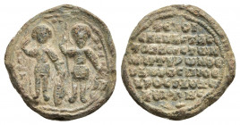PB Byzantine lead seal. (c. 11-12th century).
Obv: St. George (on the left) and St. Theodore standing, holding spears and shields. 
Rev: Inscription...