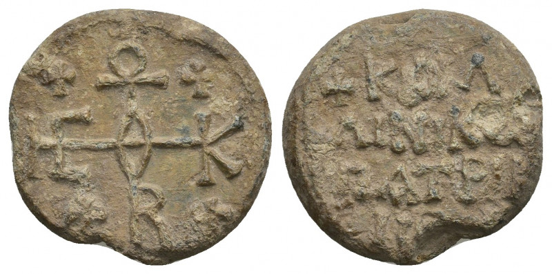 PB Byzantine lead seal. Kallinikos patrikios (7th-8th century).
Obv: Cruciform ...