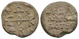 PB Byzantine lead seal. Kallinikos patrikios (7th-8th century).
Obv: Cruciform invocative monogram (type I). Θεοτόκε βοήθει. Crosses in the quarters....