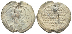 PB Byzantine lead seal. Abramios? Ek prosopou of Antiocheia (11th century).
Obv: Bust of St. Nicholas, his right hand raised before him in blessing, ...