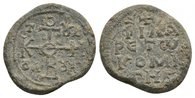 Byzantine lead seal.
ΘЄOTOKЄ BOHΘЄI in cruciform monogram above
Cruciform invo...