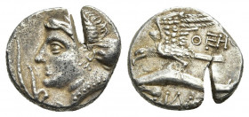 APHLAGONIA. Sinope. AR Drachm (Circa 330-300 BC). Uncertain magistrate.
Obv: Head of nymph left, with hair in sakkos; aphlaston to left.
Rev: ΘΕH / ...