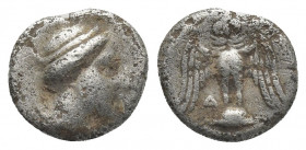 Pontos, Amisos, AR Siglos. (4th century BC).
Obv: Draped bust of Hera left wearing turreted diadem
Rev: Owl standing facing with spread wings; monog...
