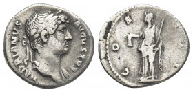 HADRIAN (117-138 AD). AR, Denarius.
Obv: HADRIANVS AVGVSTVS.
Laureate head of Hadrian, right.
Rev: COS — III.
Libertas standing left, holding cap ...