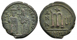 PHOCAS (602-610 AD). Follis, Antioch. Dated RY 6 (607/8).
Obv: ∂ N FOCA NЄ PЄ AV.
Phocas and Leontia standing facing with globus cruciger and crucif...
