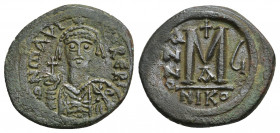 MAURICE TIBERIUS (582-602 AD). Follis, Nicomedia. 1st officina, Dated RY 6 (587/8).
Obv: D N mAVRI[C TI]bER [P P A].
Helmeted and cuirassed bust fac...
