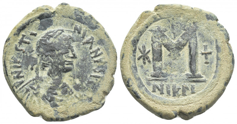JUSTINIAN I. (527-538 AD). Follis, Constantinople.
Obv: D N IVSTINIANVS P P AVG...