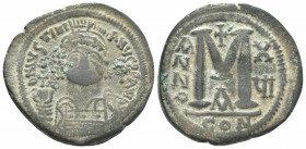 JUSTINIAN I (527-565 AD). Follis, Constantinople. Dated RY 16 (542/3).
Obv: D N IVSTINIANVS P P AVG.
Helmeted and cuirassed bust facing, holding glo...