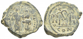Heraclius (AD 610-641), with Heraclius Constantine. AE Follis. Constantinople, 4th officina, RY2.
Obv: dd NN hЄR-ЄT hЄRA CONS.
Heraclius (on left) a...