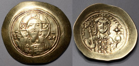 MICHEL VII Ducas et MARIA (1071-1075). Histamenon nomisma (4,40 g).
A/Buste nimbé du Christ de face, la main droite levée en signe de bénédiction, le ...