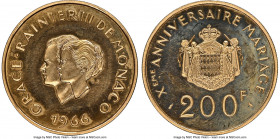 Rainier III gold Proof "10th Wedding Anniversary" 200 Francs 1966-(a) PR64 NGC, Paris mint, KM-XM2, Fr-32. Mintage: 1,000. Commemorative issue struck ...