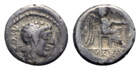M. Cato, Rome, 89 BC. AR Quinarius (12mm, 2.05g, 1h). Head of Liber r., wearing ivy wreath; control mark below. R/ Victory seated r. on throne, holdin...