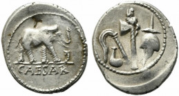 Julius Caesar, military mint traveling with Caesar, April-August 49 BC. AR Denarius (21mm, 3.82g). Elephant advancing r., trampling on horned serpent....