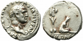 Vespasian (69-79). AR Denarius (17mm, 3.33g). “Judaea Capta” commemorative. Rome, 69-70. Laureate head r. R/ Trophy; to r., Judaea seated r. in attitu...