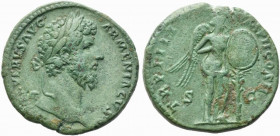 Lucius Verus (161-169). Æ Sestertius (32mm, 25.63g). Rome, AD 164. Laureate head r. R/ Victory standing r., setting on palm tree shield inscribed VIC/...