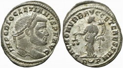Diocletian (284-305). Æ Follis (30mm, 8.52g, 6h). Rome, c. 303-5. Laureate head r. R/ Moneta standing l., holding scales and cornucopia; R-crescent-P....