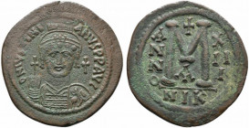 Justinian I (527-565). Æ 40 Nummi (41mm, 22.84g, 6h). Nicomedia, year 13 (539/40). Helmeted and cuirassed bust facing, holding globus cruciger and shi...