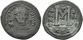 Justinian I (527-565). Æ 40 Nummi (31.5mm, 22.22g, 6h). Cyzicus, year 14 (540/41). Diademed, helmeted and cuirassed bust facing, holding globus crucig...