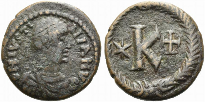 Justinian I (527-565). Æ 20 Nummi (20.5mm, 4.78g). Rome, 537-542. Diademed, drap...