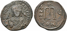 Tiberius II Constantine (578-582). Æ 40 Nummi (35mm, 17.14g, 1h). Constantinople, year 5 (578/9). Crowned facing bust, wearing consular robes, holding...
