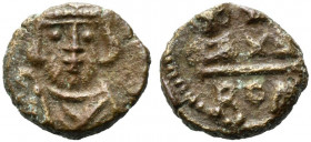 Constantine IV (668-685). Æ 20 Nummi (13mm, 2.12g). Rome. Crude crowned facing bust, holding spear. R/ Crowned facing busts of Heraclius and Tiberius;...