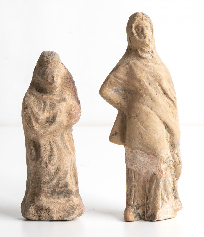 Lot of two Roman terracotta female mantled statuettes; ca. 3rd - 1st centuries B...