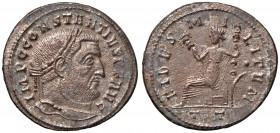 Costanzo (305-307) Follis (Ticinum) Busto laureato a d. - R/ La Fedeltà seduta a s. - RIC 55 AE (g 9,94) Graffietti da pulitura, spatinata