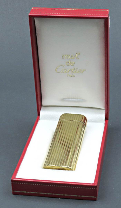 CARTIER accendino della linea Paris. Oggetto placcato in oro giallo con seriale ...