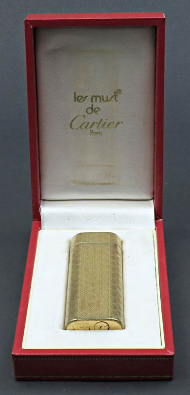 CARTIER accendino della linea Paris. Oggetto placcato in oro giallo con seriale ...