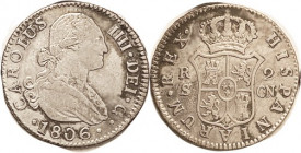 Charles IV, 2 Reales, 1806 Seville CN, VF, well struck, strong detail, ltly toned. (A VF brought $64, Ibercoin 7/21.)