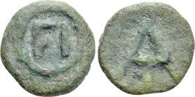 ARGOLIS. Argos. Ae Tessera or Half Unit (Circa 4th-2nd centuries BC).