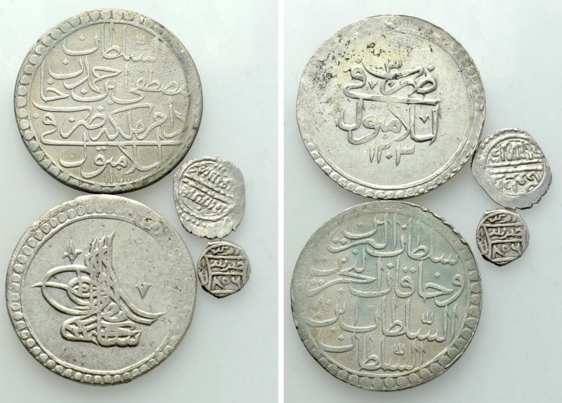 4 Islamic Coins. 

Obv: .
Rev: .

. 

Condition: See picture.

Weight: ...
