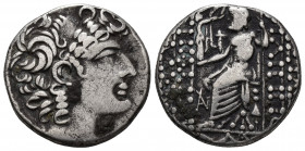 (Silver.14,79g 26mm) Seleukid Kingdom. Antioch. Philip I Philadelphos 95-75 BC. Tetradrachm AR
Diademed head right.
Rev: Zeus Nikephoros seated left...