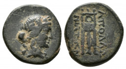 Thessaly-Euboea, Apollonia, Illyria Chalkous c. 350-300. AE
Laureate head of Apollo to right. 
Rev. AΠOΛΛΩNIATAN/ Tripod with cauldron on top.
Extr...
