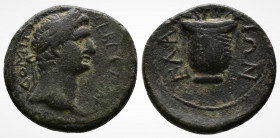 (Bronze, 2.37g 15mm) AEOLIS. Elaia. Domitian (81-96). 
 CEBACTON ΔOMITIANON. Laureate head right.
Rev: ΕΛΑΙΤΩΝ. Basket containing two poppies flanke...