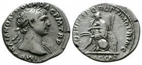 (Silver, 2.80g 20mm) Trajan (AD 98-117). Silver denarius 
laureate head of Trajan right 
Rev.Dacian, wearing cap, seated left on pile of arms, two c...
